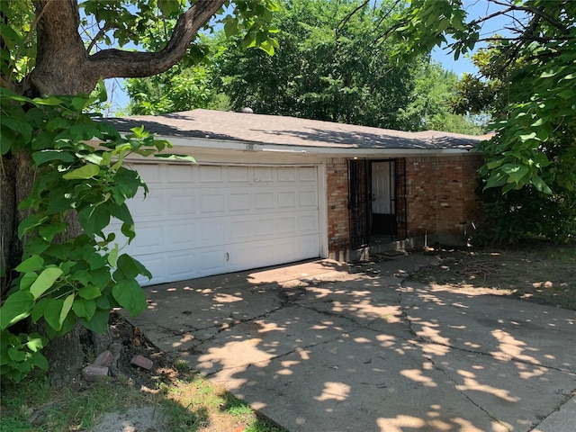 1317 W Bruton Rd, Mesquite, TX 75149 - garage featuring driveway