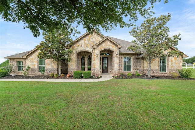 1009 Maida Vale, Haslet, TX 76052 - french country style house featuring a front lawn and stone siding