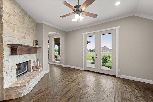 1009 Maida Vale, Haslet, TX 76052 - unfurnished living room featuring french doors, wood finished floors, crown molding, baseboards, and arched walkways