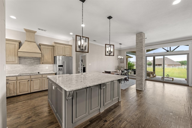 1009 Maida Vale, Haslet, TX 76052 - kitchen featuring high quality fridge, custom exhaust hood, ornamental molding, black electric stovetop, and decorative backsplash