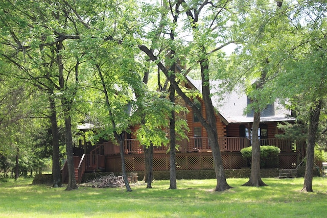 1147 Rs County Road 3503, Emory, TX 75440 - view of green lawn with a wooden deck