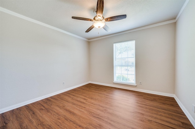 5072 Stanley Dr, The Colony, TX 75056 - unfurnished room with wood finished floors, a ceiling fan, baseboards, and ornamental molding