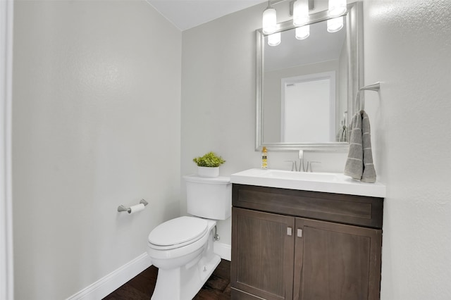 3925 Wisteria Ln, Haltom City, TX 76137 - half bath with vanity and wood finished floors
