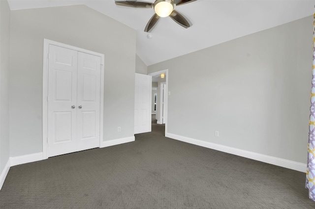 3925 Wisteria Ln, Haltom City, TX 76137 - unfurnished bedroom with lofted ceiling, dark carpet, a closet, and ceiling fan