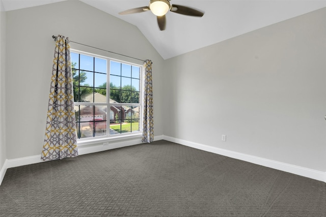 3925 Wisteria Ln, Haltom City, TX 76137 - empty room with vaulted ceiling, ceiling fan, and dark colored carpet