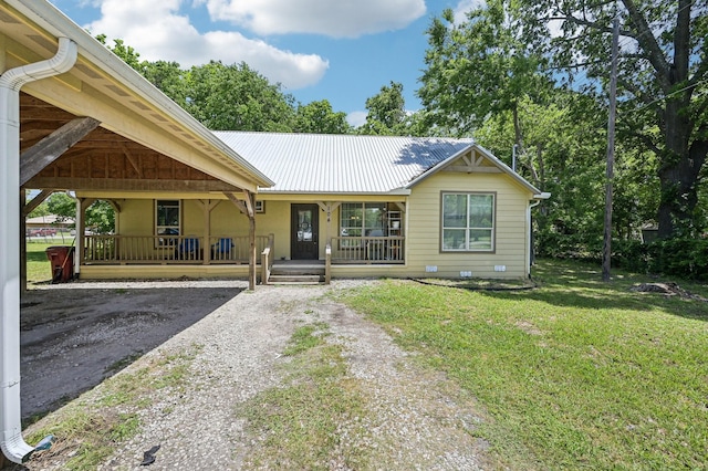 104 S Cedar St, Leonard, TX 75452 - view of front facade featuring a porch, a front lawn, and metal roof