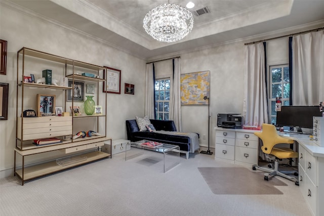 carpeted home office featuring a chandelier, a tray ceiling, and ornamental molding
