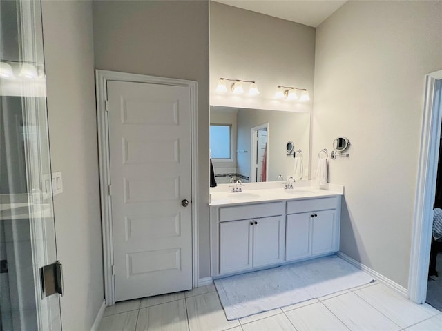120 Black Alder Dr, Fort Worth, TX 76131 - bathroom featuring double vanity, baseboards, and tile patterned floors