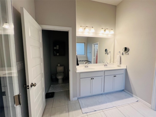 120 Black Alder Dr, Fort Worth, TX 76131 - bathroom with double vanity, toilet, and tile patterned floors