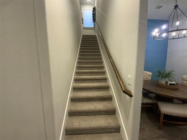 120 Black Alder Dr, Fort Worth, TX 76131 - staircase with a chandelier and baseboards