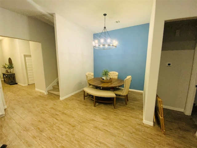 120 Black Alder Dr, Fort Worth, TX 76131 - dining room with stairway, light wood-type flooring, a chandelier, and baseboards