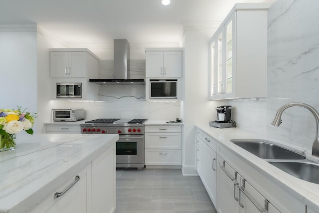 2525 N Pearl St Unit 1203, Dallas, TX 75201 - kitchen with stainless steel appliances, wall chimney range hood, a sink, backsplash, and ornamental molding