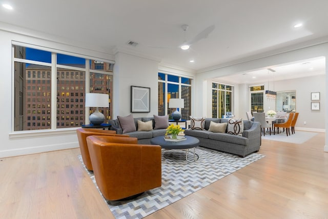 2525 N Pearl St Unit 1203, Dallas, TX 75201 - living room featuring ornamental molding, a ceiling fan, baseboards, light wood-style flooring, and recessed lighting