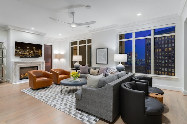 2525 N Pearl St Unit 1203, Dallas, TX 75201 - living room featuring a ceiling fan, wood finished floors, a premium fireplace, crown molding, and recessed lighting