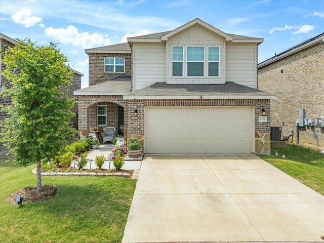 1359 Panorama Dr, Forney, TX 75126 - view of front of property featuring central air condition unit, a garage, a front yard, driveway, and brick siding