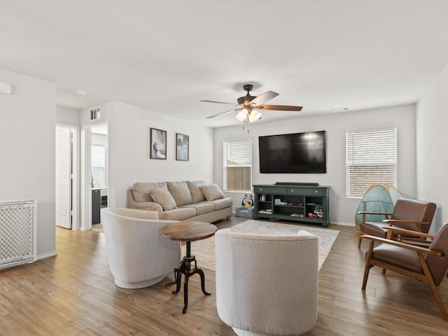 1359 Panorama Dr, Forney, TX 75126 - living area with a ceiling fan, wood finished floors, and baseboards