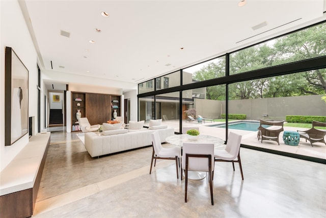 view of patio with an outdoor living space, fence, and outdoor dining space
