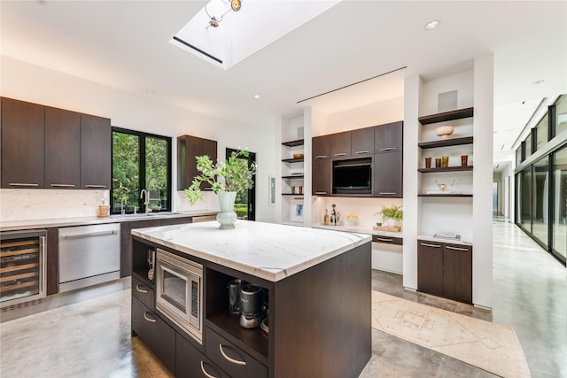 kitchen featuring open shelves, wine cooler, modern cabinets, appliances with stainless steel finishes, and finished concrete floors