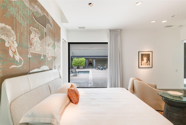 bedroom with recessed lighting
