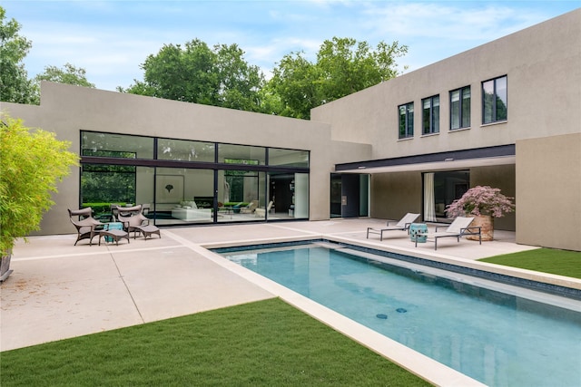 outdoor pool with a patio