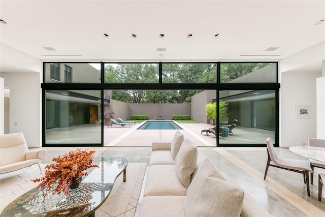 living room with a wall of windows