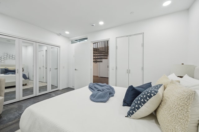511 N Akard St Unit 1501, Dallas, TX 75201 - bedroom with two closets and recessed lighting