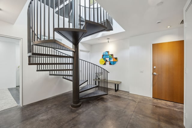511 N Akard St Unit 1501, Dallas, TX 75201 - stairs with finished concrete flooring