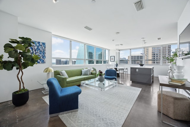 511 N Akard St Unit 1501, Dallas, TX 75201 - living area featuring finished concrete flooring