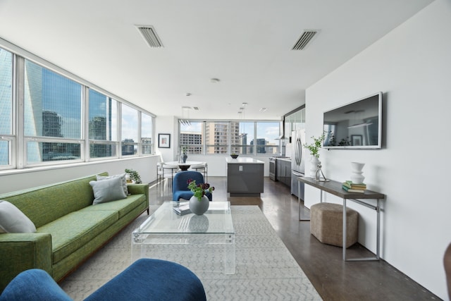 511 N Akard St Unit 1501, Dallas, TX 75201 - living area featuring finished concrete flooring