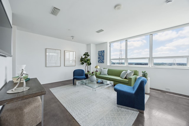 511 N Akard St Unit 1501, Dallas, TX 75201 - living area featuring concrete floors