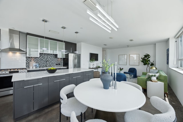 511 N Akard St Unit 1501, Dallas, TX 75201 - dining area with finished concrete flooring