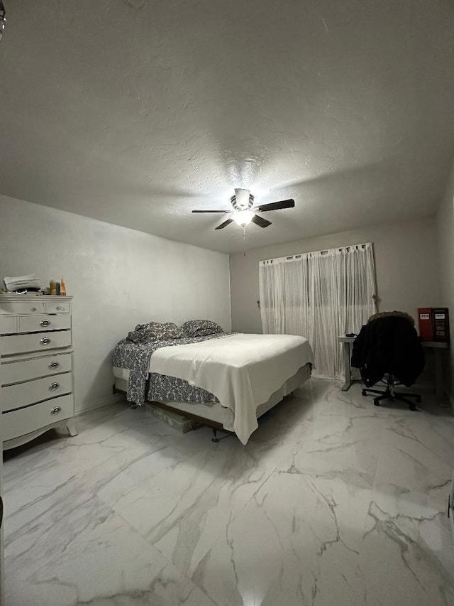 10125 Peppertree Ln, Fort Worth, TX 76108 - bedroom featuring marble finish flooring, ceiling fan, and a textured ceiling