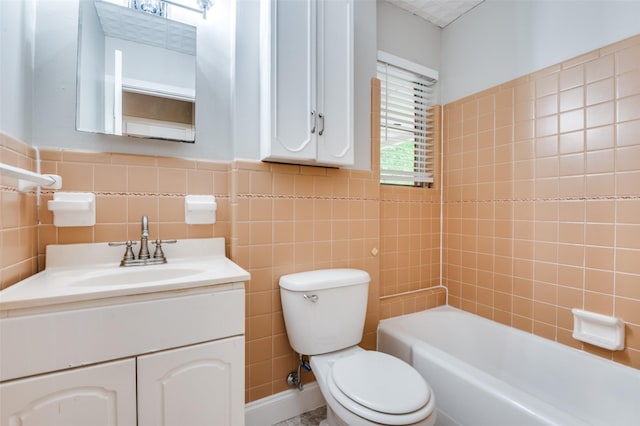 2018 Shawnee St, Denton, TX 76209 - bathroom featuring toilet, tile walls, and vanity