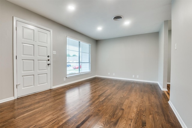 2018 Shawnee St, Denton, TX 76209 - foyer entrance featuring dark wood-style flooring, baseboards, and recessed lighting