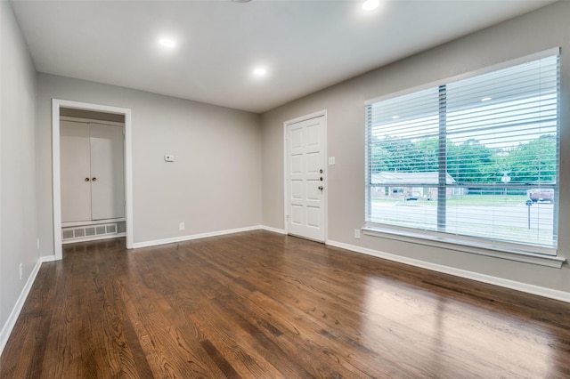 2018 Shawnee St, Denton, TX 76209 - unfurnished room featuring dark wood finished floors, baseboards, and recessed lighting