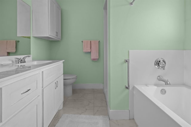 1461 Vz County Road 4607, Ben Wheeler, TX 75754 - bathroom featuring marble finish flooring, baseboards, a garden tub, toilet, and vanity