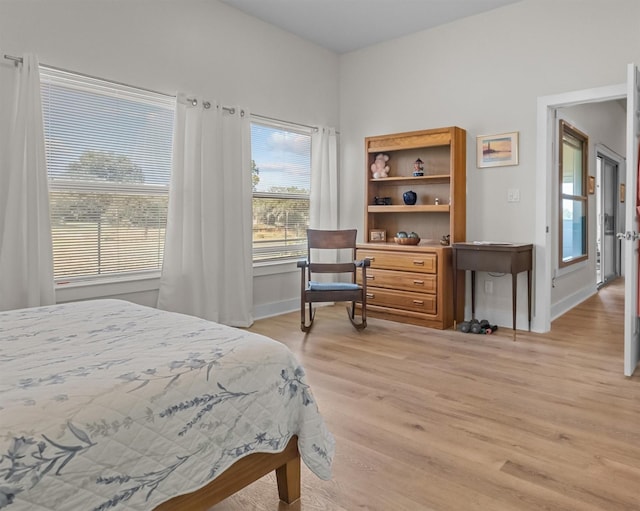 1461 Vz County Road 4607, Ben Wheeler, TX 75754 - bedroom featuring light wood-style floors and baseboards