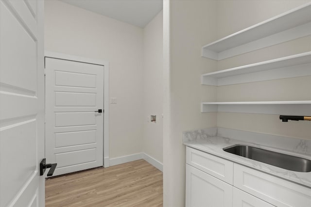 3725 Creek View Dr, Mckinney, TX 75071 - laundry room featuring cabinet space, light wood-style floors, washer hookup, and baseboards