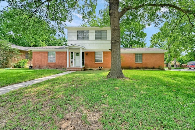 506 Melody Ln, Gainesville, TX 76240 - view of front of property featuring brick siding and a front lawn