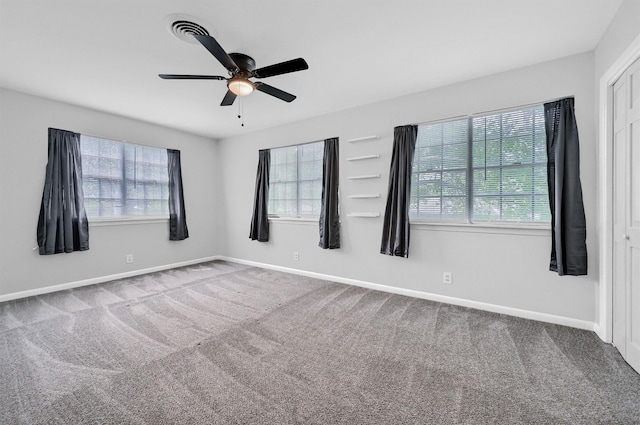 506 Melody Ln, Gainesville, TX 76240 - empty room featuring carpet flooring, ceiling fan, and baseboards
