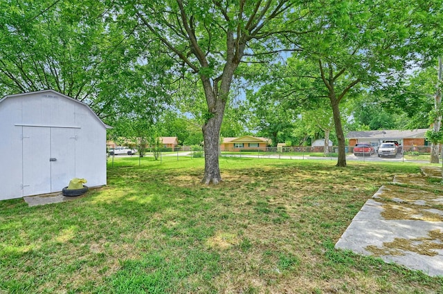 506 Melody Ln, Gainesville, TX 76240 - view of yard featuring a storage shed and an outbuilding