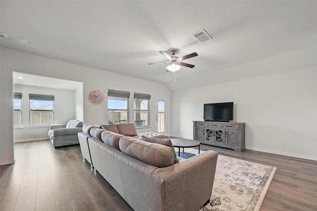 312 Duke Ct, Fate, TX 75189 - living area featuring a ceiling fan, dark wood-type flooring, and baseboards