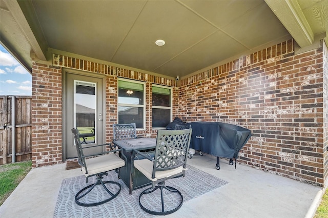 312 Duke Ct, Fate, TX 75189 - view of patio / terrace featuring outdoor dining space, a grill, and fence