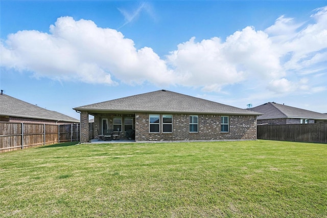 312 Duke Ct, Fate, TX 75189 - rear view of house featuring brick siding, a patio, and a shingled roof
