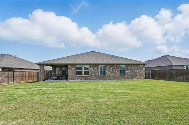 312 Duke Ct, Fate, TX 75189 - rear view of house with a patio area, brick siding, and roof with shingles