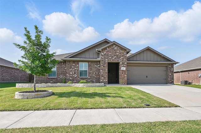 312 Duke Ct, Fate, TX 75189 - ranch-style home with board and batten siding, an attached garage, brick siding, and driveway