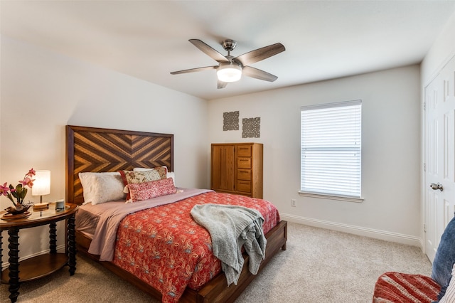 2120 Burnside Dr, Fort Worth, TX 76177 - bedroom with light carpet, baseboards, a closet, and a ceiling fan