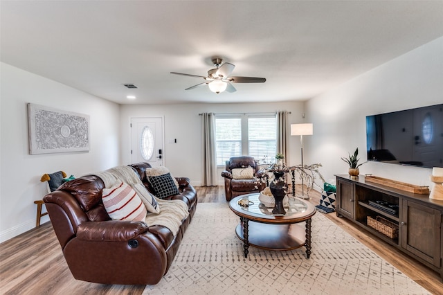 2120 Burnside Dr, Fort Worth, TX 76177 - living area with light wood-type flooring, a ceiling fan, and baseboards