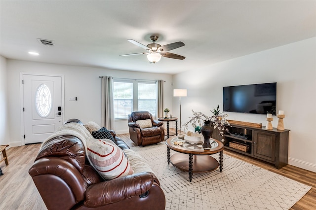 2120 Burnside Dr, Fort Worth, TX 76177 - living room with wood finished floors, ceiling fan, healthy amount of natural light, and baseboards