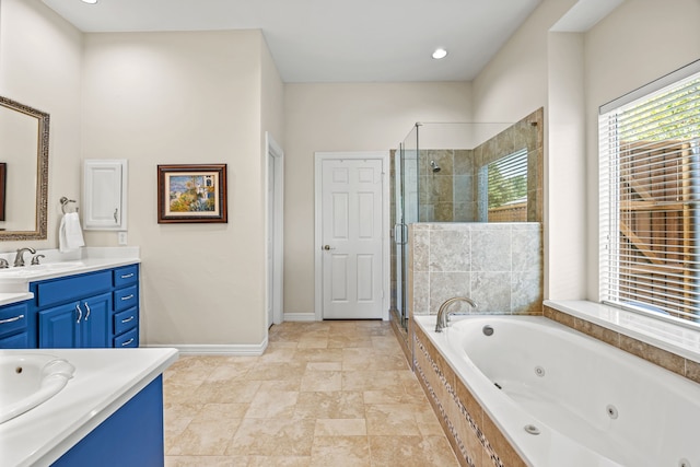 508 Wellington Rd, Coppell, TX 75019 - bathroom featuring a stall shower, a tub with jets, vanity, and baseboards